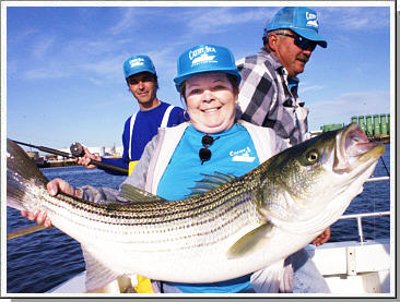 Photo courtesy of APP - Cathy Cursi holding her 34 pound striper